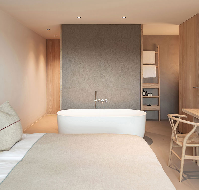 Modern hotel furniture setup in a luxury guest room